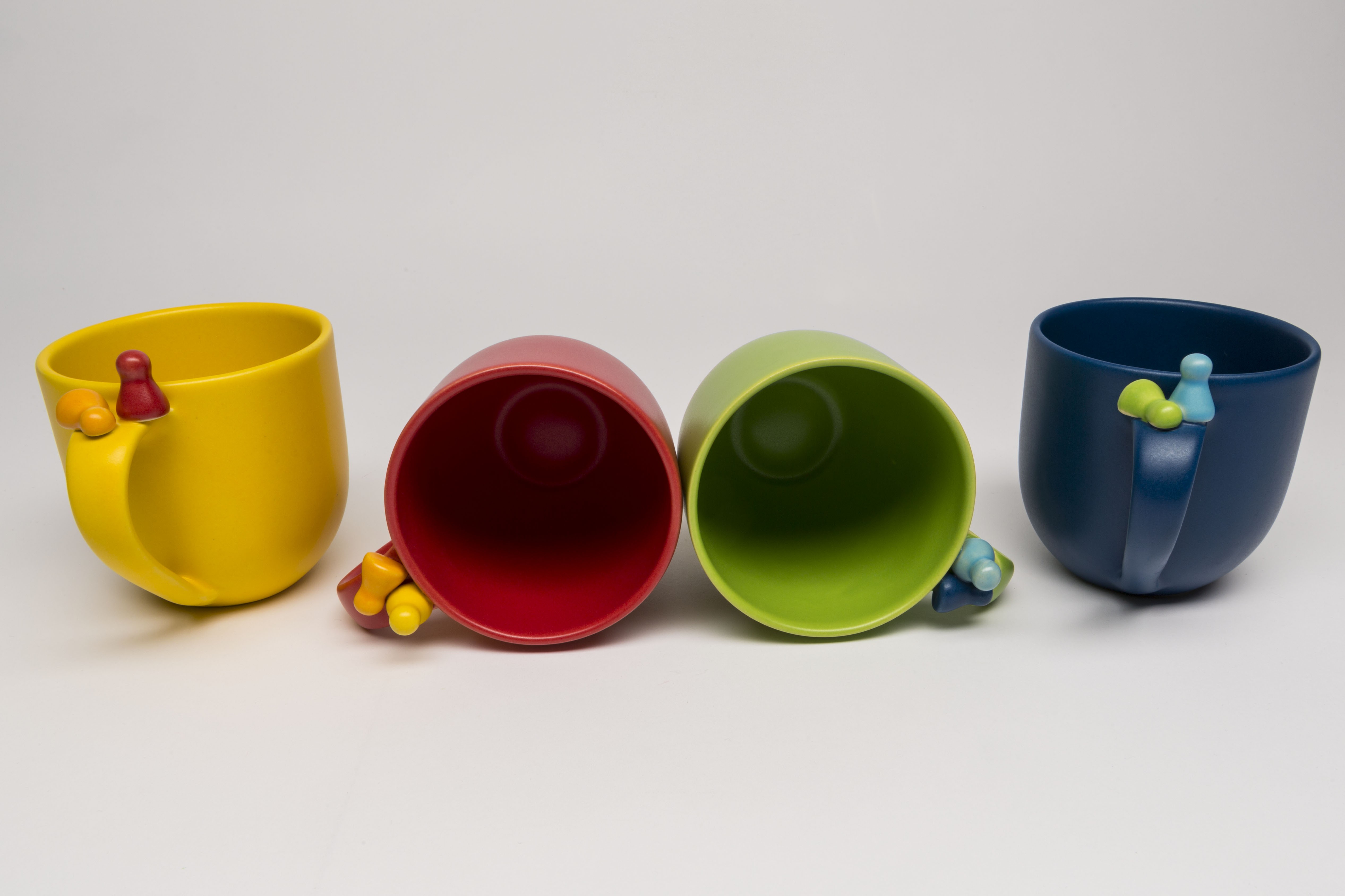 Cup with handle and pawn