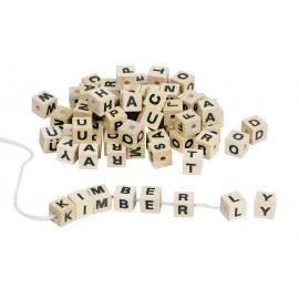 Wooden dice with letters and hole